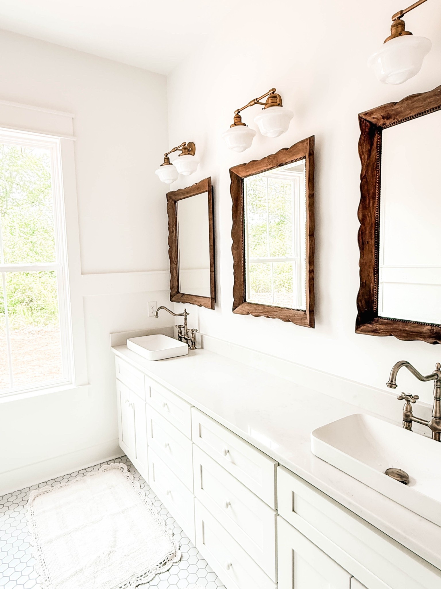 These darling mirrors make all the difference in our master bath, along with the faucets. Secret? They aren’t bath faucets, they’re kitchen faucets! I wanted a higher profile and impact in the space. #masterbath #bathmirrors #magnoliahome #cottagebath #cottagefarmhouse #bathfaucets #vintagefaucet

#LTKHome