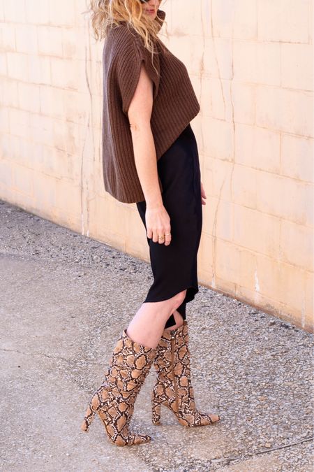 Those holiday looks can be neutral without being boring, ya know?

Cozy chocolate sweater with a satin midi skirt (under $40!) with a pair of snakeskin slouchy boots. Size small in sweater and skirt, size 8 in boots  

#LTKstyletip #LTKsalealert #LTKHoliday