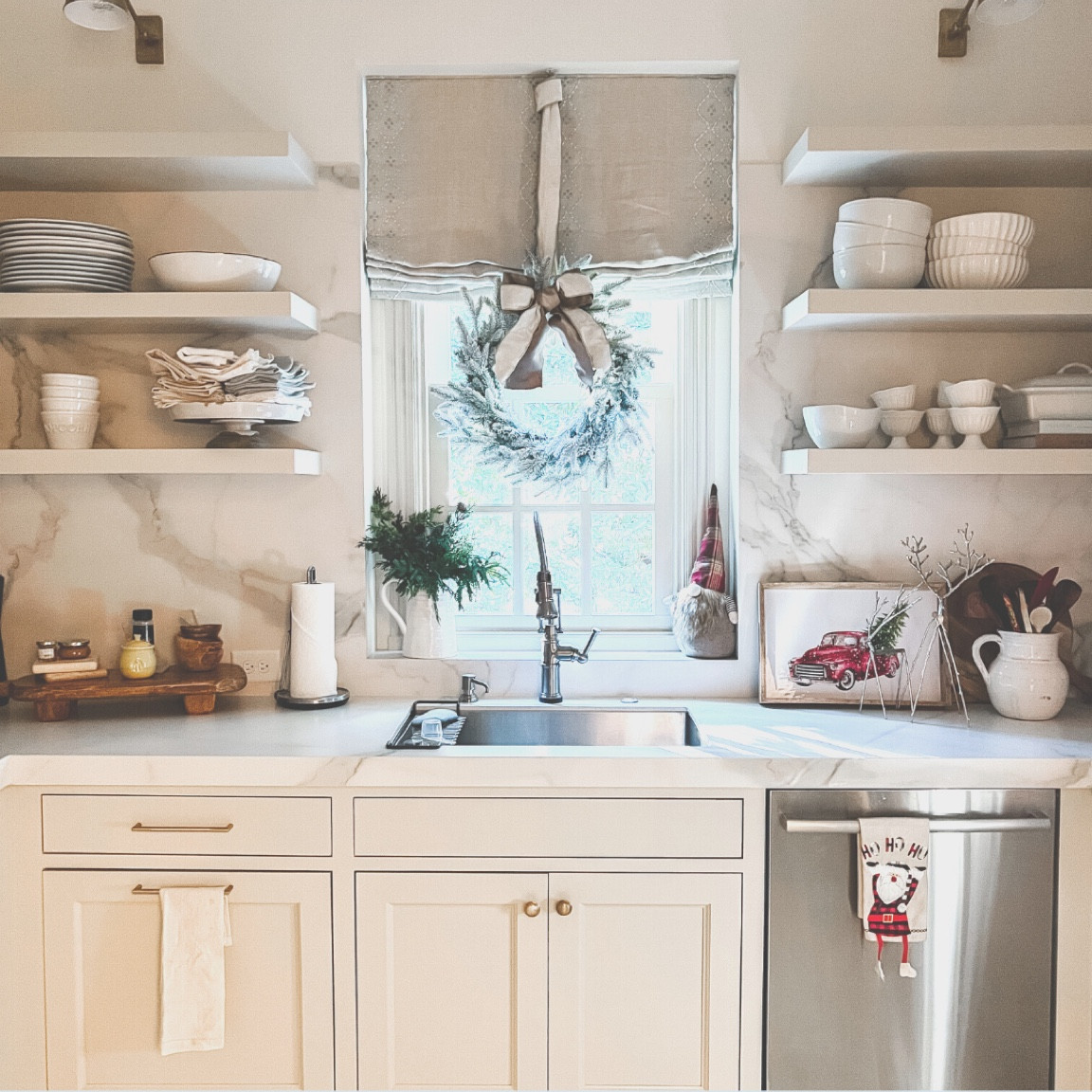 White flocked wreath hung with white
Velvet ribbon  

#LTKhome #LTKHoliday #LTKSeasonal