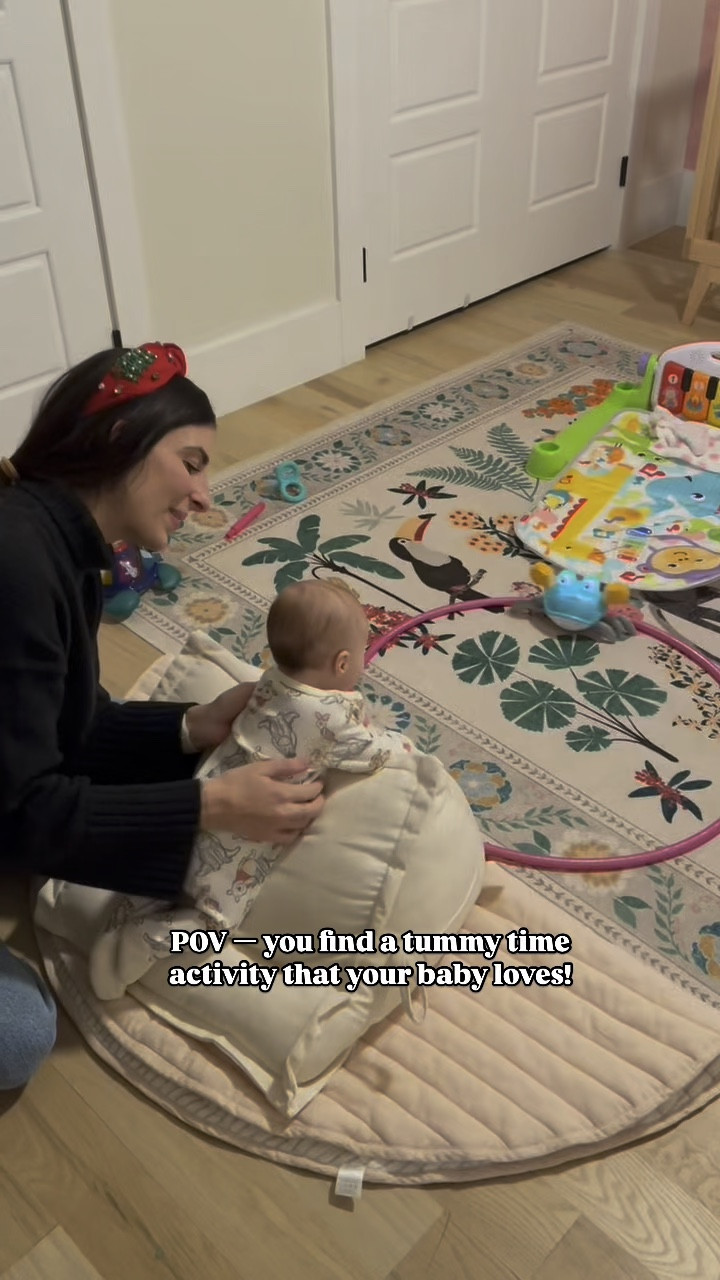 Vivi loves this tummy time activity! These items would make a great gift for a baby or mama to be! 🫶🏼

We’re using the peekaboo pillow in the video and it is made in the U.S. and great quality material. If you want a discount, shop through their website and use code CHAE

Aff link: https://peekaboopillow.com?sca_ref=6621140.yLQUvoFHPP

I linked the Toddlekind quilted play mat underneath that we use often as well. It’s handmade, organic cotton, reversible, and easy to clean! 

Finally, the dancing crab is so fun! This is what truly makes the activity engaging. It’s rechargeable (USB-C) and has a two different modes. The hula hoop is a must with it to keep it from getting stuck on things! 

#LTKBaby #LTKHoliday #LTKWatchNow
