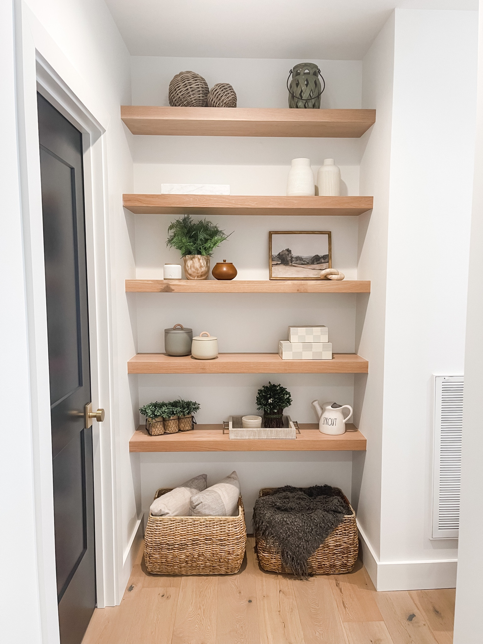 We removed the “linen closet” and replaced it with open, floating shelves that I can decorate. It makes for a great focal piece. 

#LTKhome