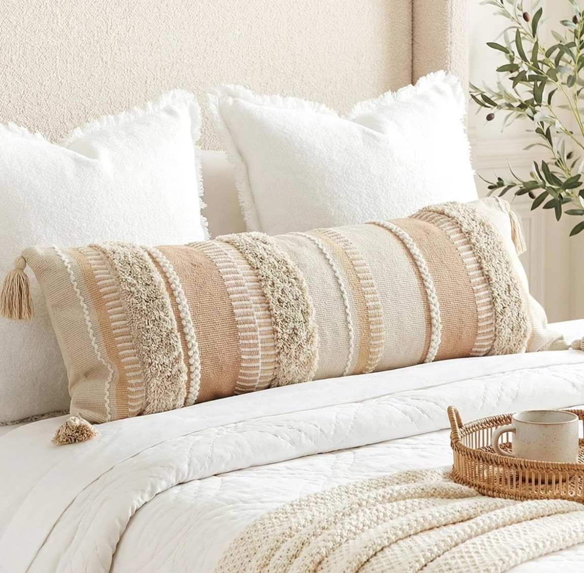 The cutest little refresh for your home. 🤍 These boho farmhouse lumbar pillow covers add soft texture, neutral warmth, and charming tassel details to any bed or couch. Perfect for layering into bedrooms, sofas, or benches when your space needs an easy update that feels cozy and elevated.

Freshen up your space with one simple swap. ✨

#LTKSeasonal #LTKU #LTKHome