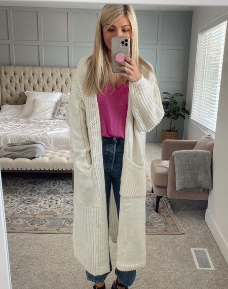 Outfit from todays post! Wearing Nordstrom longline cardigan in white. Pink racerback cami, and straight leg Levis jeans!

#LTKunder100 #LTKHoliday
