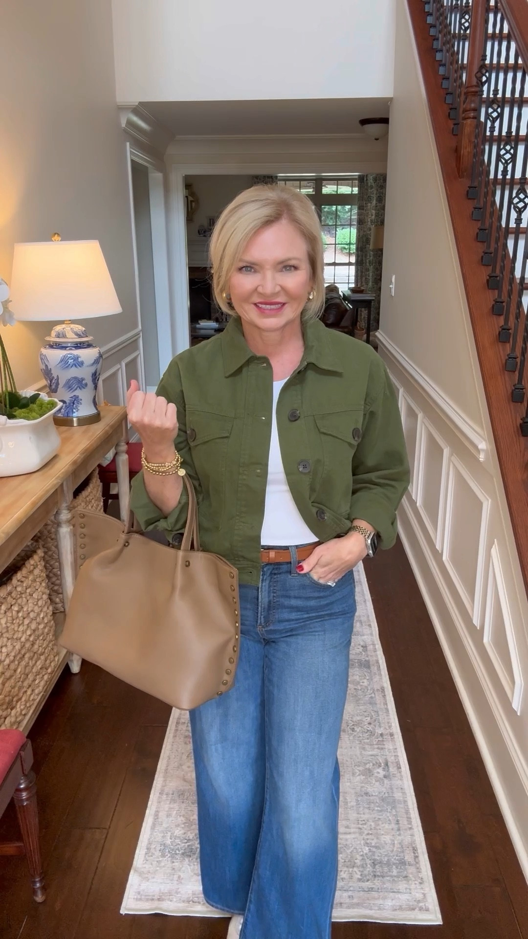 Yes, you can wear wide leg jeans even if you're petite! These high rise wide leg jeans from Chico's come in petite, making them perfect to wear with sneakers like I've done here. A cropped jacket has the perfect proportion with the wider leg jeans. 
The bag is from Amazon and right on trend with the rivet detailing! I'm wearing Medium tank, small jacket and 0 Petite jeans. 

Jeans
Wide leg denim
Fall outfit
Trendy
Petite
Over 50

#LTKStyleTip #LTKItBag #LTKOver40