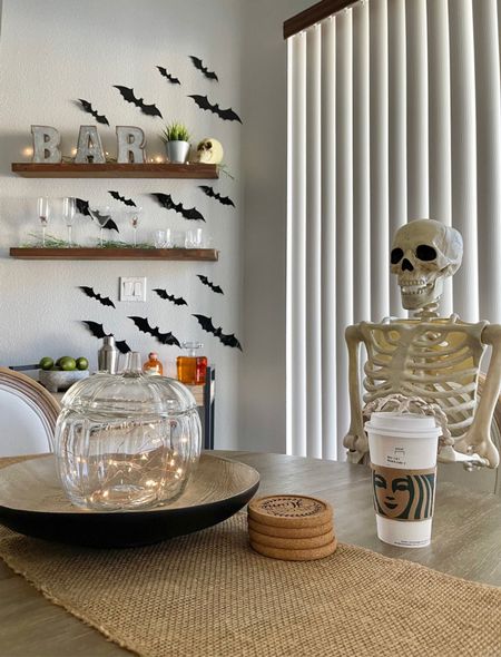 Spooky Bar Cart & Table Decor 🦇

Bar cart. Life size skeleton. Bats. Glass pumpkin jar. Fairy lights. Galvanized letters. Halloween decor. Fall decor. 

#LTKhome #LTKSeasonal #LTKHalloween