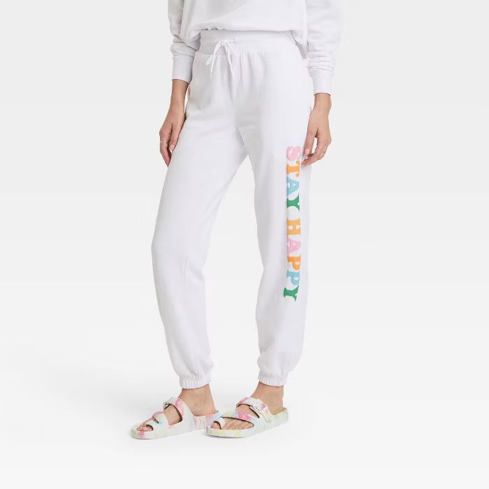 Women's Stay Happy Graphic Jogger Pants - White | Target