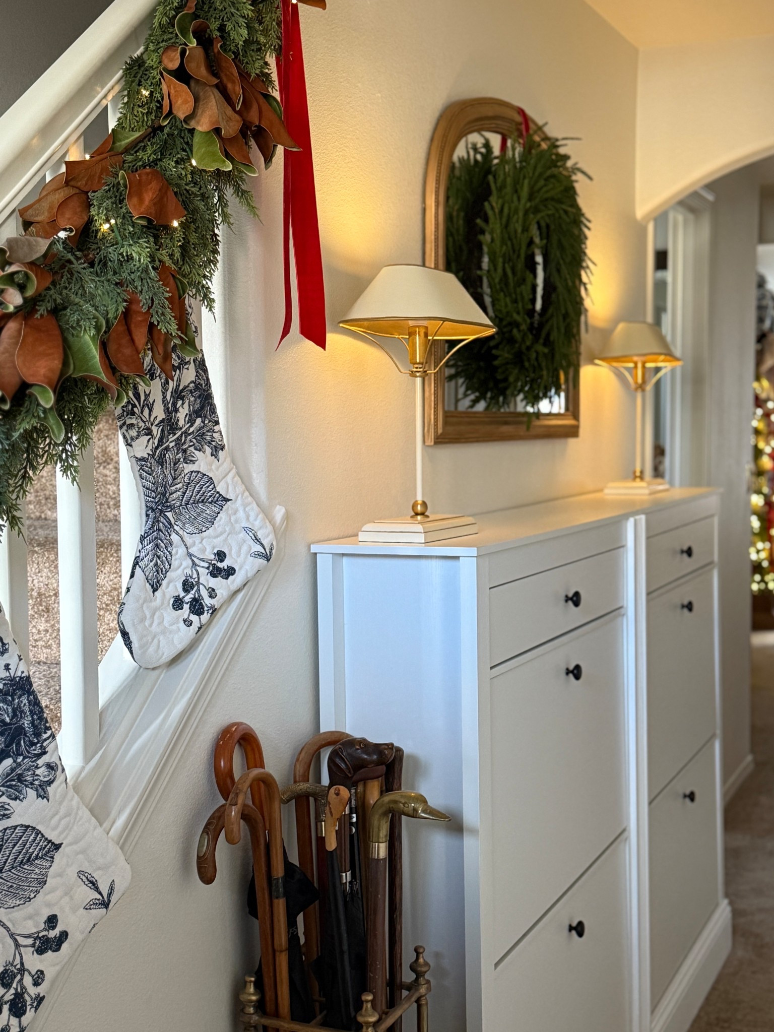 Holiday glow with the Daphne table lamp from Lightopia! 💡 

All sources linked so you can recreate this space. 🫶🏼 Blue toile stockings are creative co-op brand. 

#LTKHome #LTKHoliday