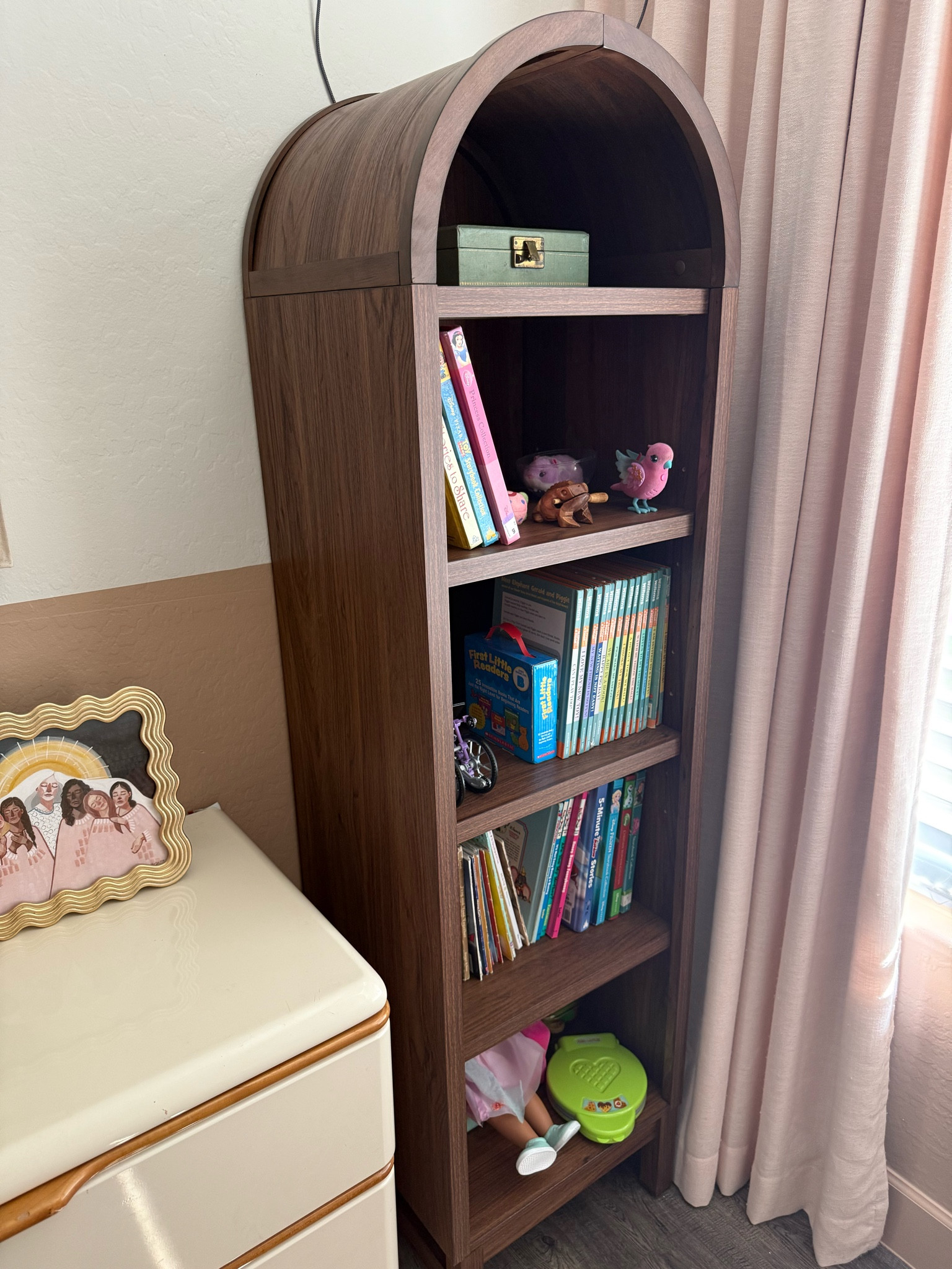 Cutest arched bookshelf from Walmart! This bookcase holds my daughter's books and Knick knacks. Under $150! 

#LTKFamily #LTKHome