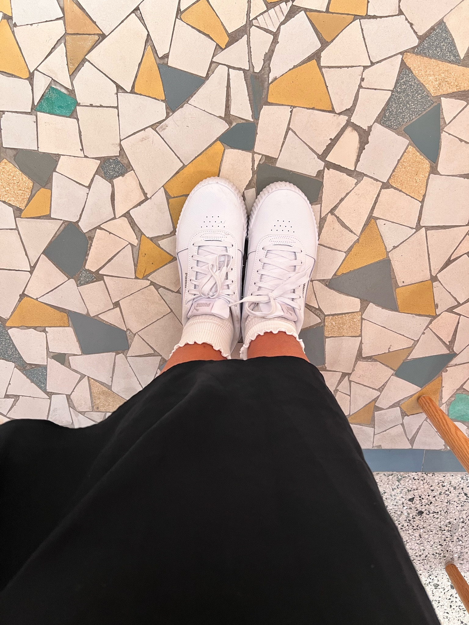 White sneakers and ruffle socks 