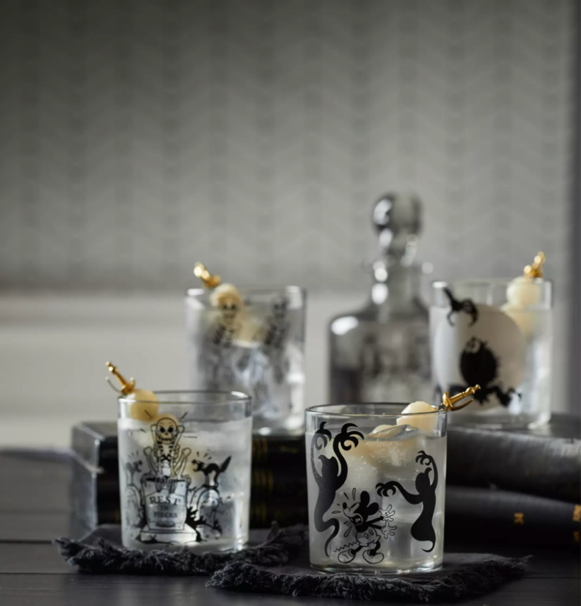 Calling all Disney nostalgists! The iconic "Skeleton Dance" collection has returned with a bang! Relive the classic Disney short with a range of bewitching offerings, perfect for your Halloween-themed home decor. From hauntingly adorable throw pillows featuring Mickey and Minnie in their skeleton outfits to eerie wall art that captures the spirit of the original animation, these items are sure to add a touch of vintage Disney charm to your abode. 

#LTKunder100 #LTKunder50 #LTKSeasonal