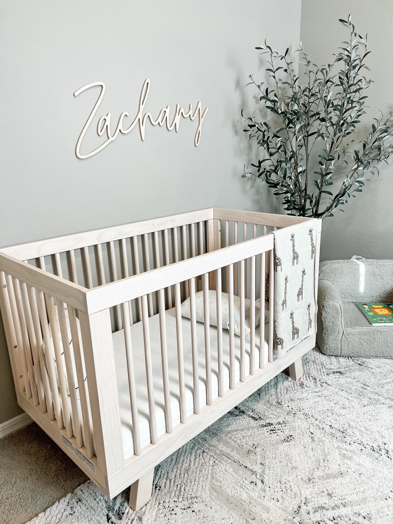 Nursery crib + essentials☁️ 

#nursery #nurserydecor #namesign #woodnamesign #amazonhome #amazonbaby #amazonmusthaves #babyroom #toddlerkids #babynursery #neutralnursery #babyletto #babylettocrib #kytebaby #nurseryinspo #neutrals #baby #newborn #nurserymusthaves #babyboy #babygirl #genderneutral #nurseryideas #nurserydecor #babyshower #babyshowergiftideas #babyregistry #babyregistrymusthaves #giftideasfornewmom #giftideasformomtobe #babysleepbag #sleepingbag #babypillow #throwblanket #nurserydesign #nurseryessentials #olivetree #artificialtree #targethome #targetfinds #targetmcgeeandco #mcgeeandco 

#LTKbump #LTKhome #LTKbaby