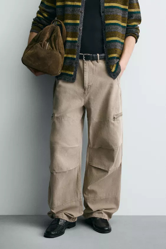 Relaxed fit pants made of cotton fabric. Front pockets and back flap pockets. Zip pockets at legs... | Zara US