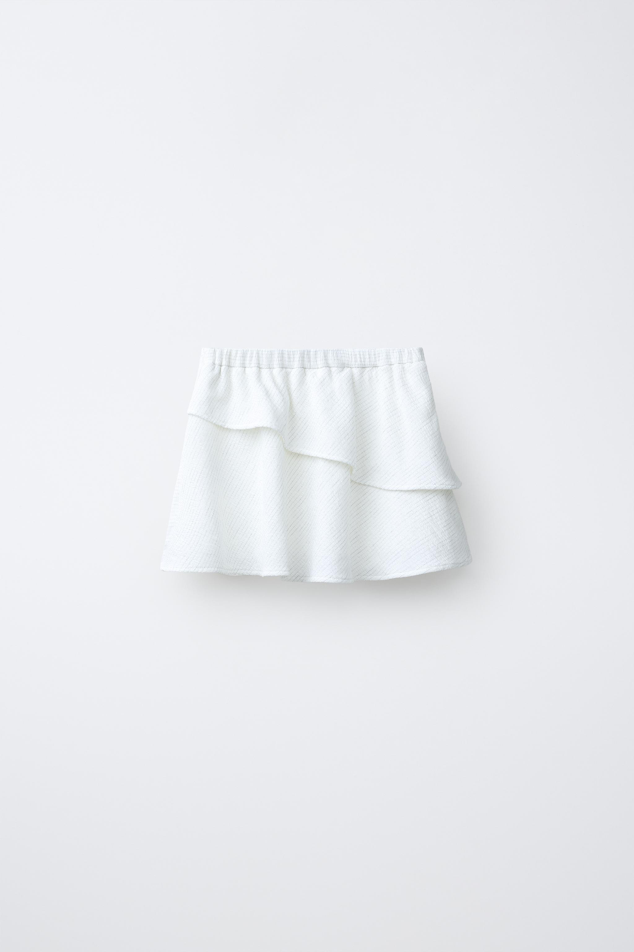 DescriptionContentsMeasurementsPareo skirt with elastic waistband and side knot appliqu\u00e9. Ru... | Zara US