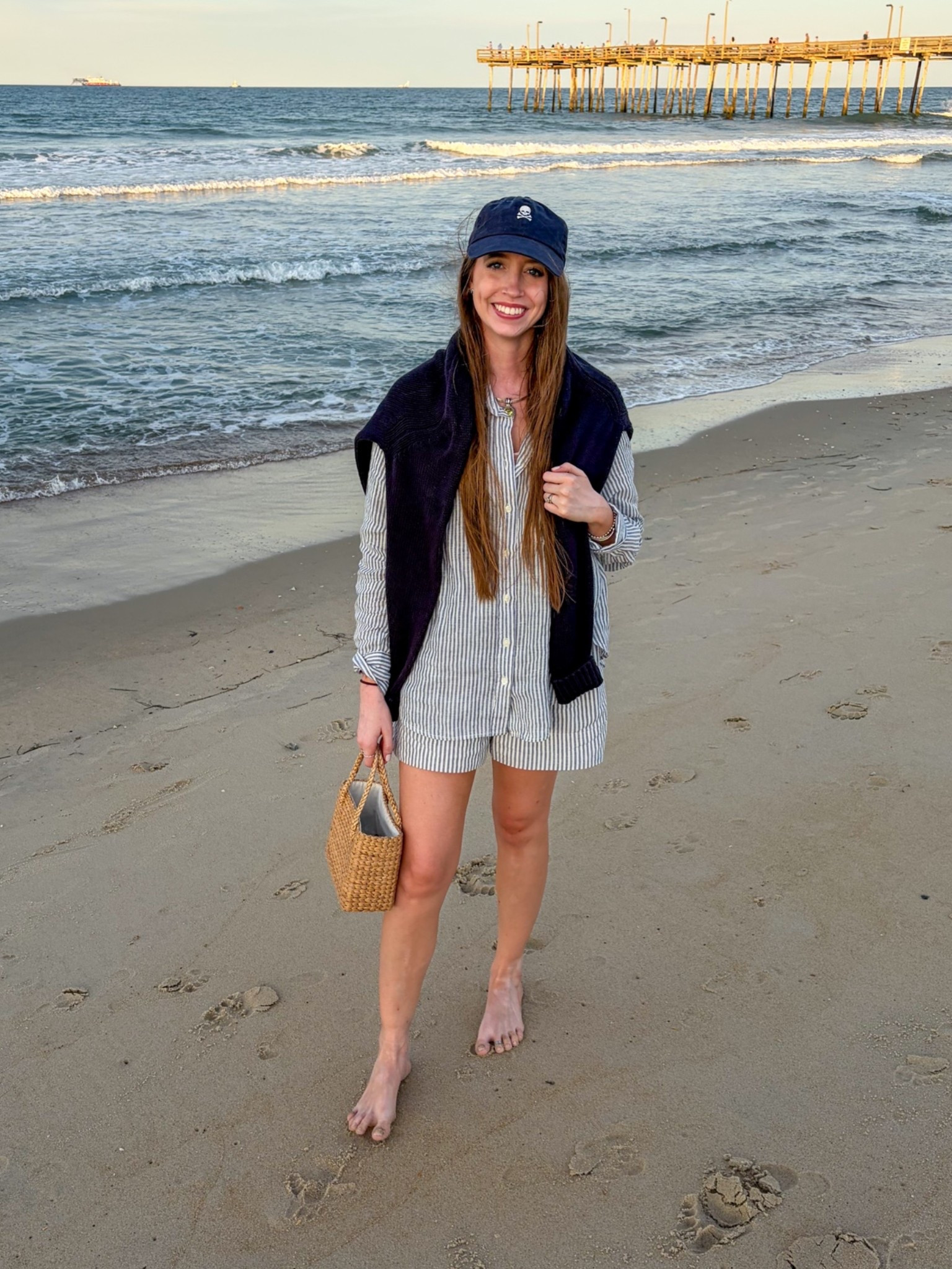Matching sets are my summer bff!! This one is true to size, wearing a small in the shirt and the shorts. 
Summer outfit 
Linen shirt 
Linen shorts 
Raffia bag 
Navy blue sweater 
Beach vacation linen set

#LTKSeasonal #LTKSaleAlert