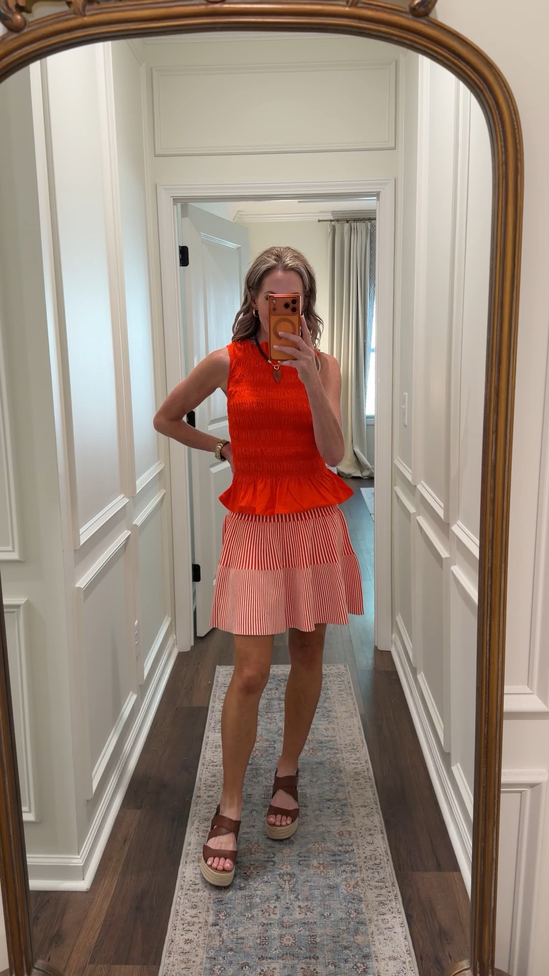 The look of spring is this popsicle orange striped ribbed tier mini skirt. I love it both in the blue and white and now in the orange and white looks so perfect with this rouge top and many of your other Walmart new arrivals wearing a size extra small in both.