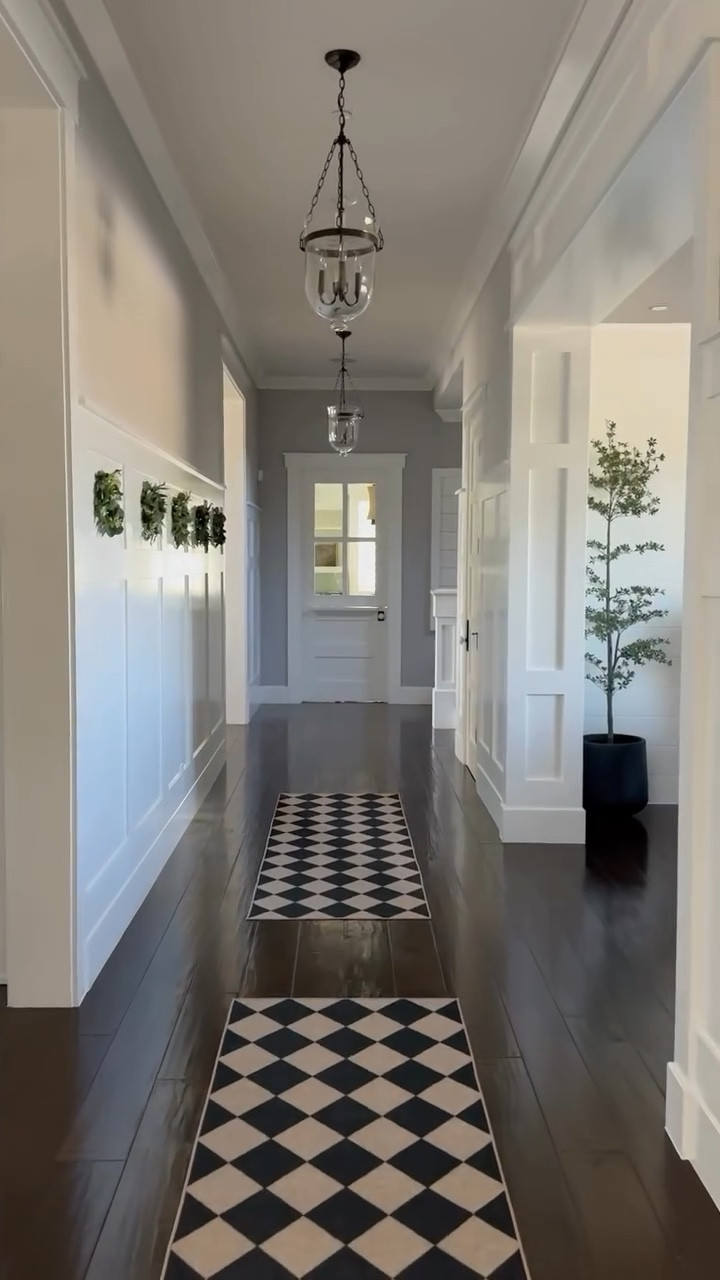 Hallway wreaths and rugs. 🤩 The rugs were a happy mistake! I ordered one for my laundry room and it was too big. I tossed it in my hallway thinking I would return it and magic! Loved it in this space! So I ordered a second. They add so much personality! 🖤 Feeling ready for spring so I also added some pretty little spring wreaths. Hello hallway refresh! I think I like you. 🤩

#LTKHome #LTKWatchNow #LTKSeasonal