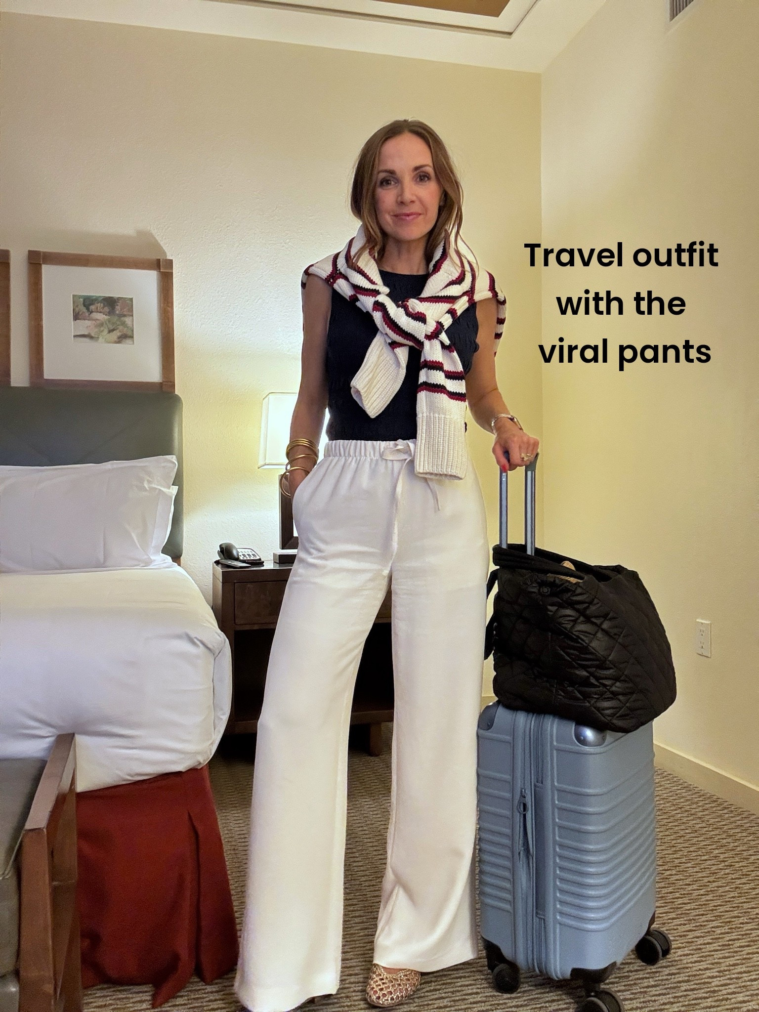 Travel outfit wearing the viral pants - wearing a small tall and I’m 5’6”