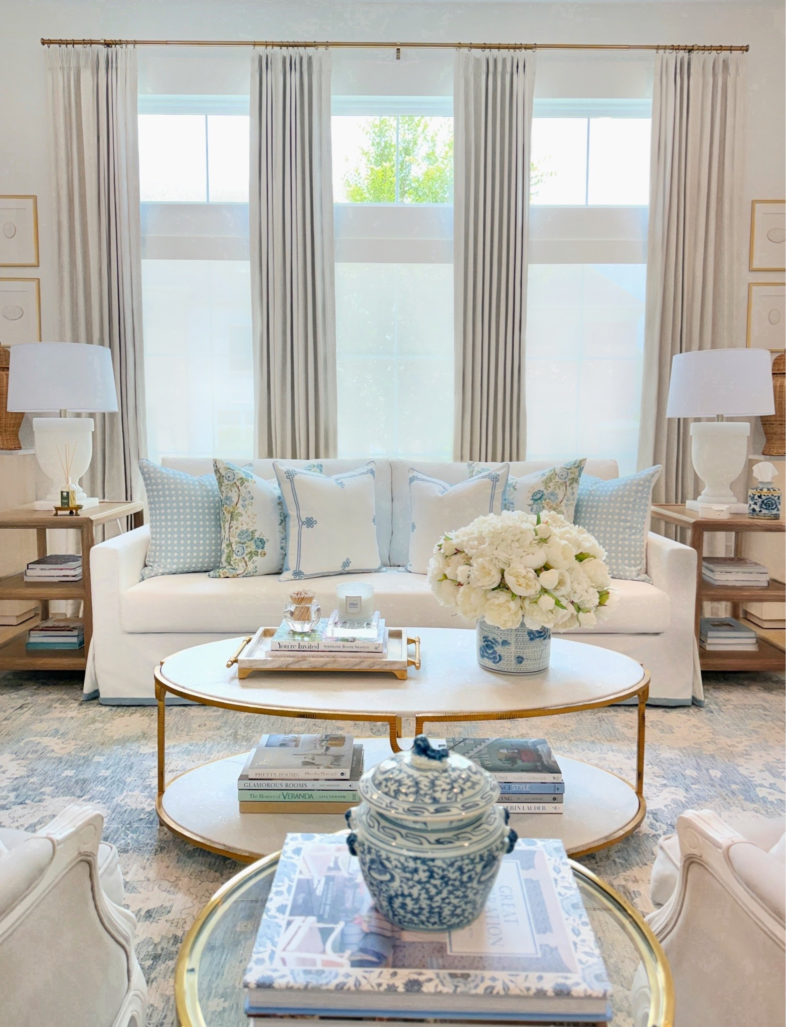 Summer living room styling summer decor blue and white cane print pillow white sofa marble coffee table traditional home timeless classic style Amazon prime day deals Amazon pinch pleat curtains

#LTKSaleAlert #LTKHome