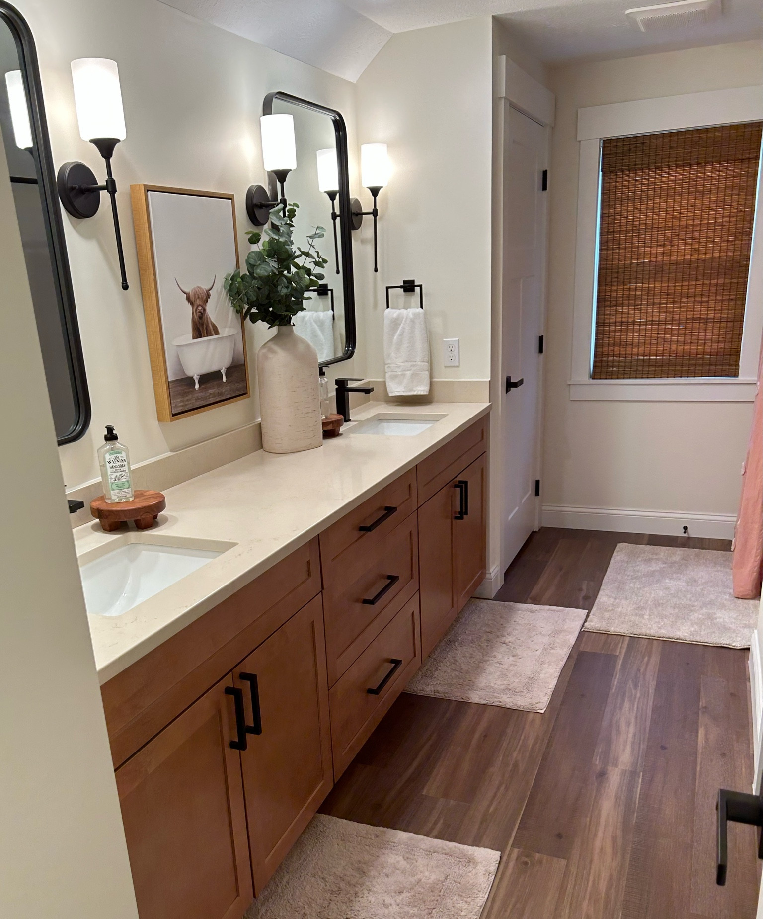 This is the upstairs bathroom in our lake house/the Oasis carriage house. I love how much room there is and I love the mirror mirrors. 

#LTKHome #LTKFindsUnder100