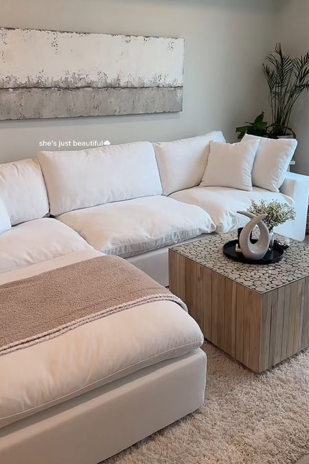 cloud couch dupe☁️ canvas artwork is from HomeGoods, white table centerpiece is from HomeGoods, blanket is Barefoot Dreams, candle is Hotel Collection, and coffee table is from Joss & Main! 

#LTKstyletip #LTKhome #LTKfamily