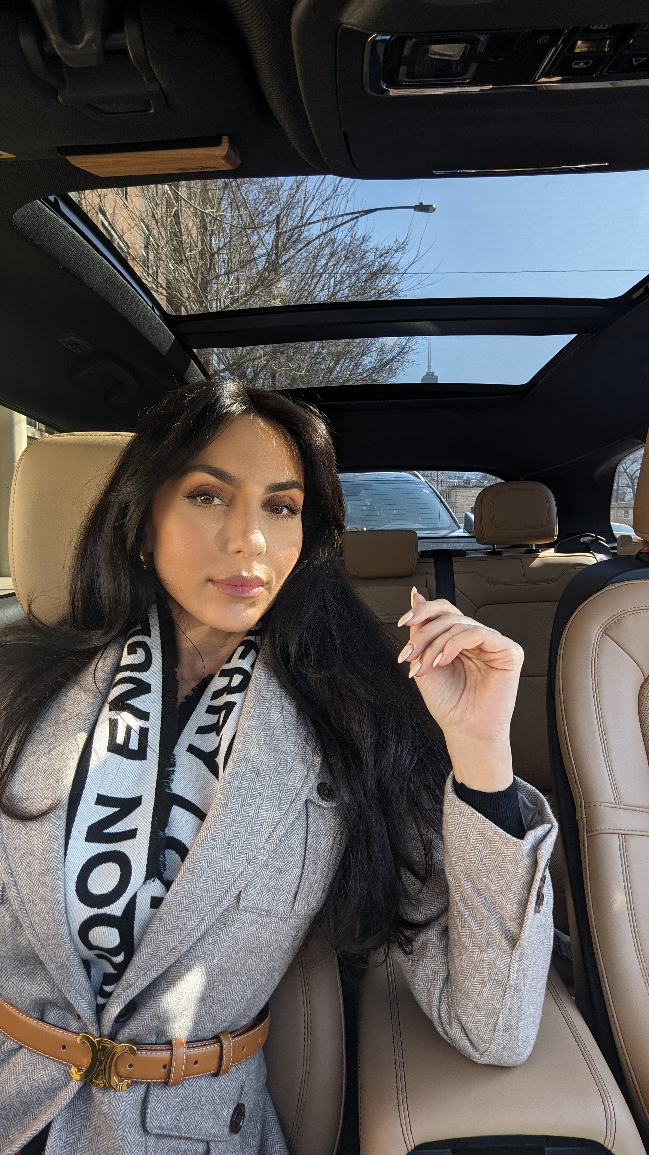 Ready for the day in my herringbone coat and a chic scarf! This look is perfect for those sunny, yet cool, days. Details on the belt and coat are linked! #winterstyle #carselfie #ootd 

 #LTKdayinmylife #LTKootd #LTKSaleAlert
