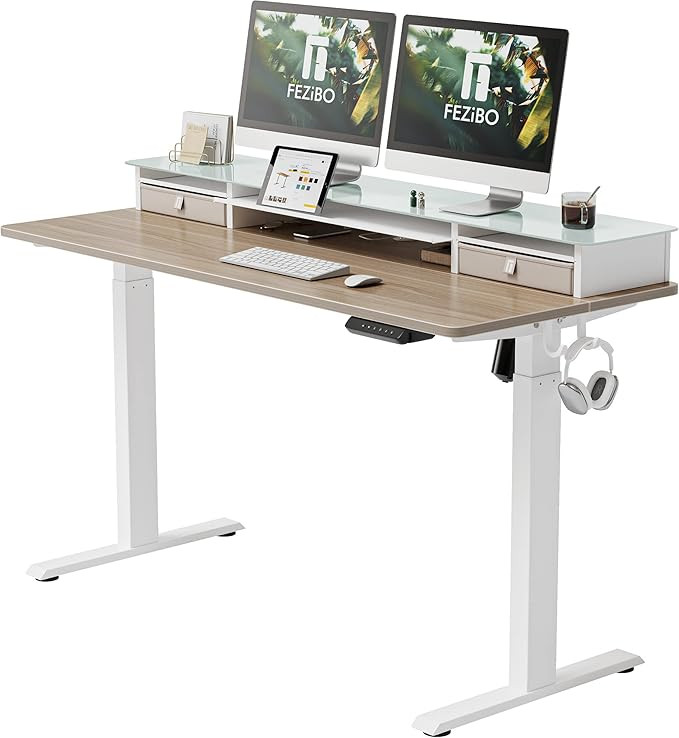 FEZIBO Electric Standing Desk with Glass Top Monitor Stand,55 x 24 Inch Adjustable Sit Stand Up T... | Amazon (US)