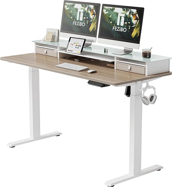 FEZIBO Electric Standing Desk with Glass Top Monitor Stand,55 x 24 Inch Adjustable Sit Stand Up T... | Amazon (US)