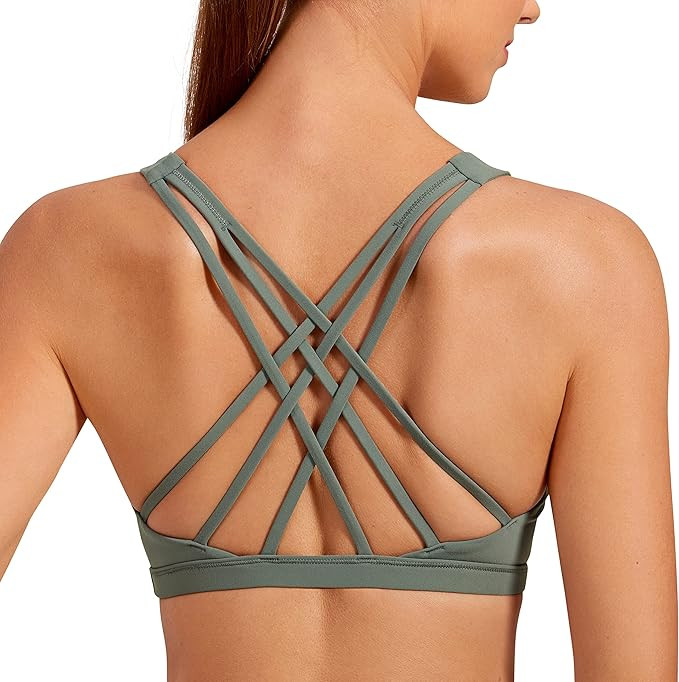 CRZ YOGA Strappy V Neck Sports Bras for Women - Criss Cross Back Wireless Padded Workout Yoga Bra | Amazon (US)