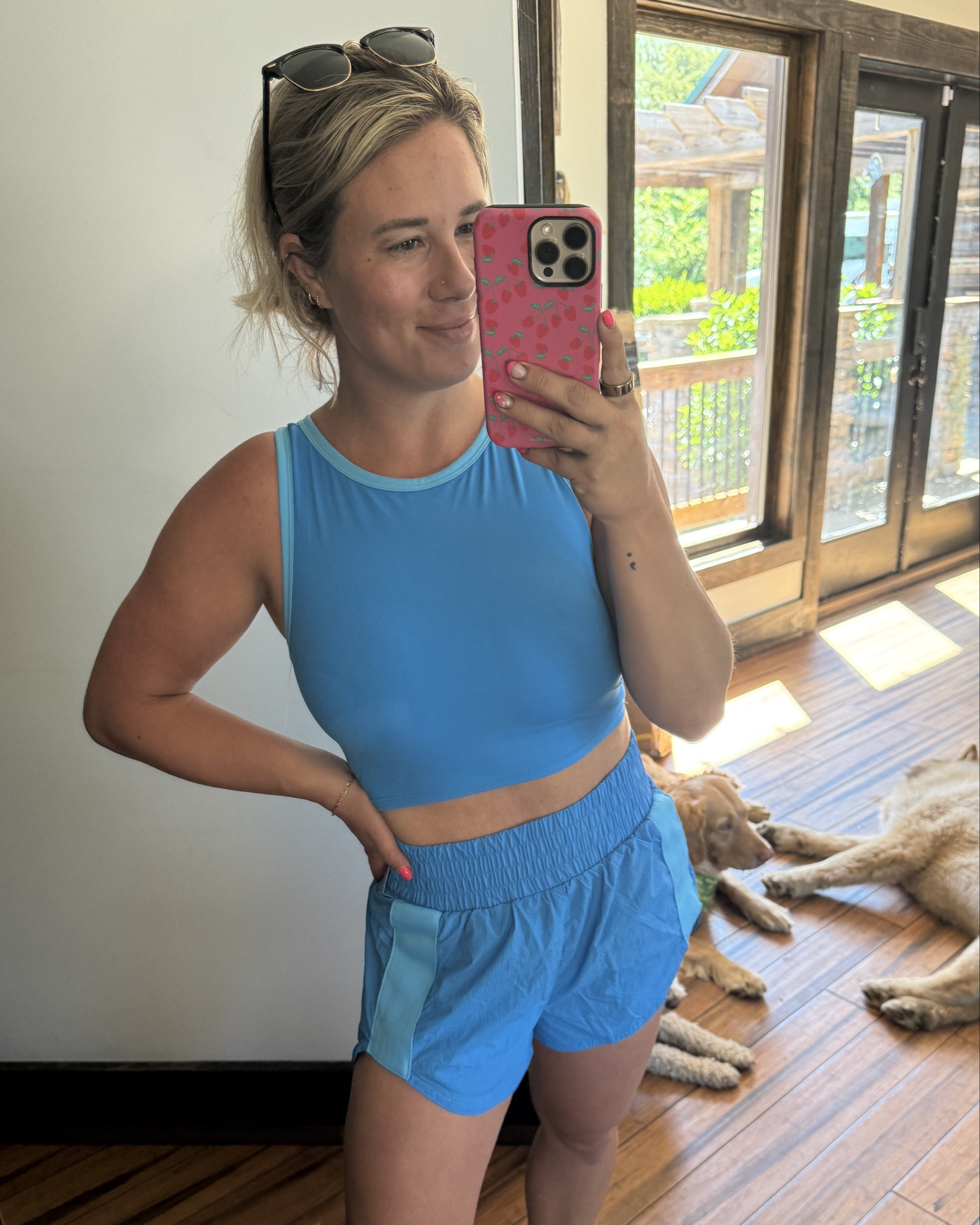 Obsessed with the back of these sport bra/active tops! 

Active wear, track shorts, bright blue, active mom 

#LTKPetite #LTKFindsUnder50 #LTKActive