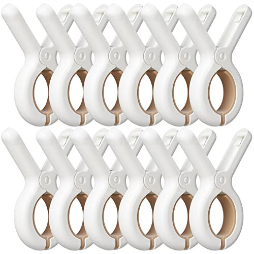 12 Pack Plastic Clothes Pins with Strong Anti-Rust Springs,Heavy Duty Beach Towel Clips,Laundry Clothespins to Keep Your Towel, Clothes, Blankets to Dry on Clothesline and Hanging Rack | Amazon (US)