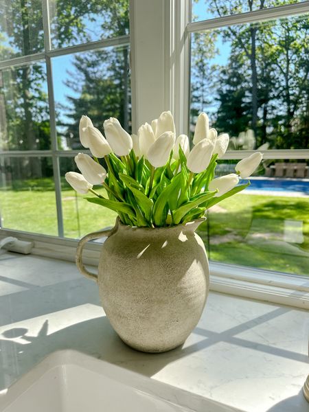 These realistic, white artificial tulips are gorgeous. This Amazon  find will elevate your space. 

#LTKHome #LTKFindsUnder50 #LTKSaleAlert
