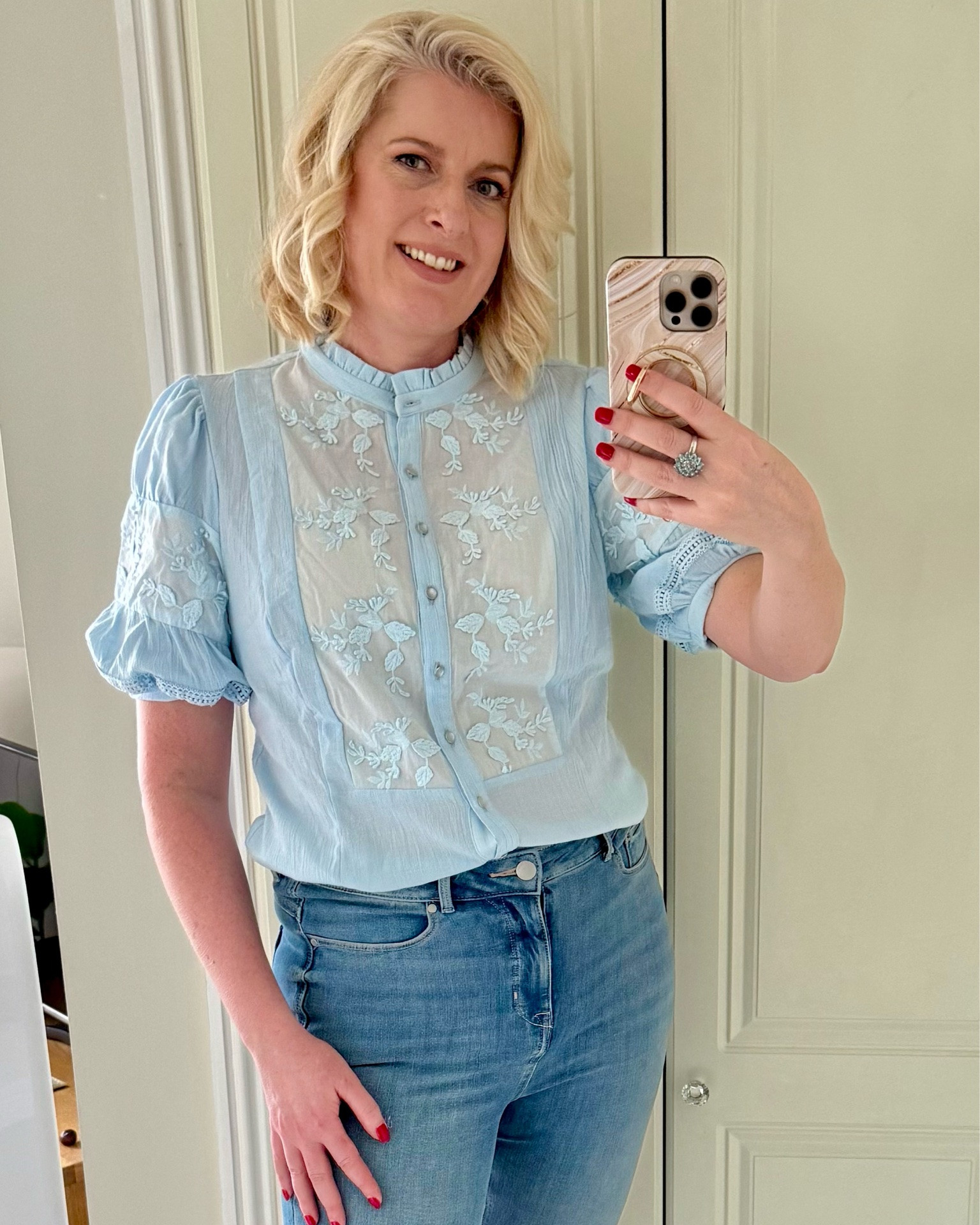 Hi everyone! I love a pretty floral blouse. This one has flowers embroidered on the sleeves and front with a subtle puff sleeve & pearlescent buttons down the front. It’s also available in white & green, but I loved this powdery blue colour. Its vintage vibe works perfectly with my vintage style leather boots in cream. 
Jeans are magic shaping slim fit which are so flattering & available in different lengths. 

U.K. blogger, Joe browns, M&S, Marks & Spencer, tall, midsize, spring, summer, 40 plus.

#LTKuk #LTKspring #LTKsummer