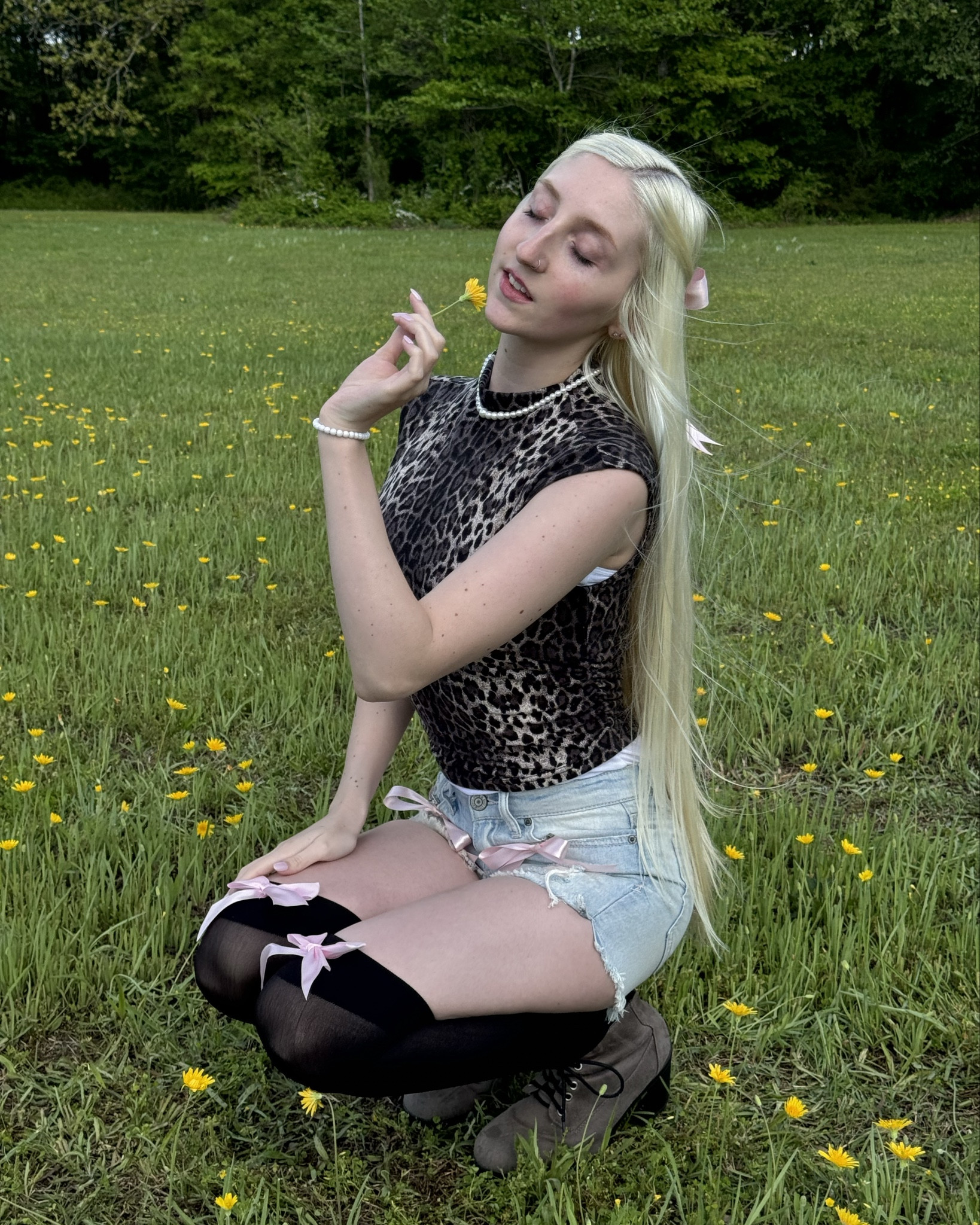 Wearing a cute leopard print top size Small, with light wash jean shorts that I attached bows to, as well as black tights that have pink bows. Also wearing comfy grey suede heels that are TTS. 

#LTKFindsUnder50 #LTKSeasonal #LTKSummerSales