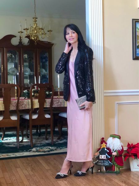 Switching the silver theme from my last post to a black sequin jacket and accessories to match gives this pink jewel-embellished slipdress another beautifully festive look!


#LTKHoliday