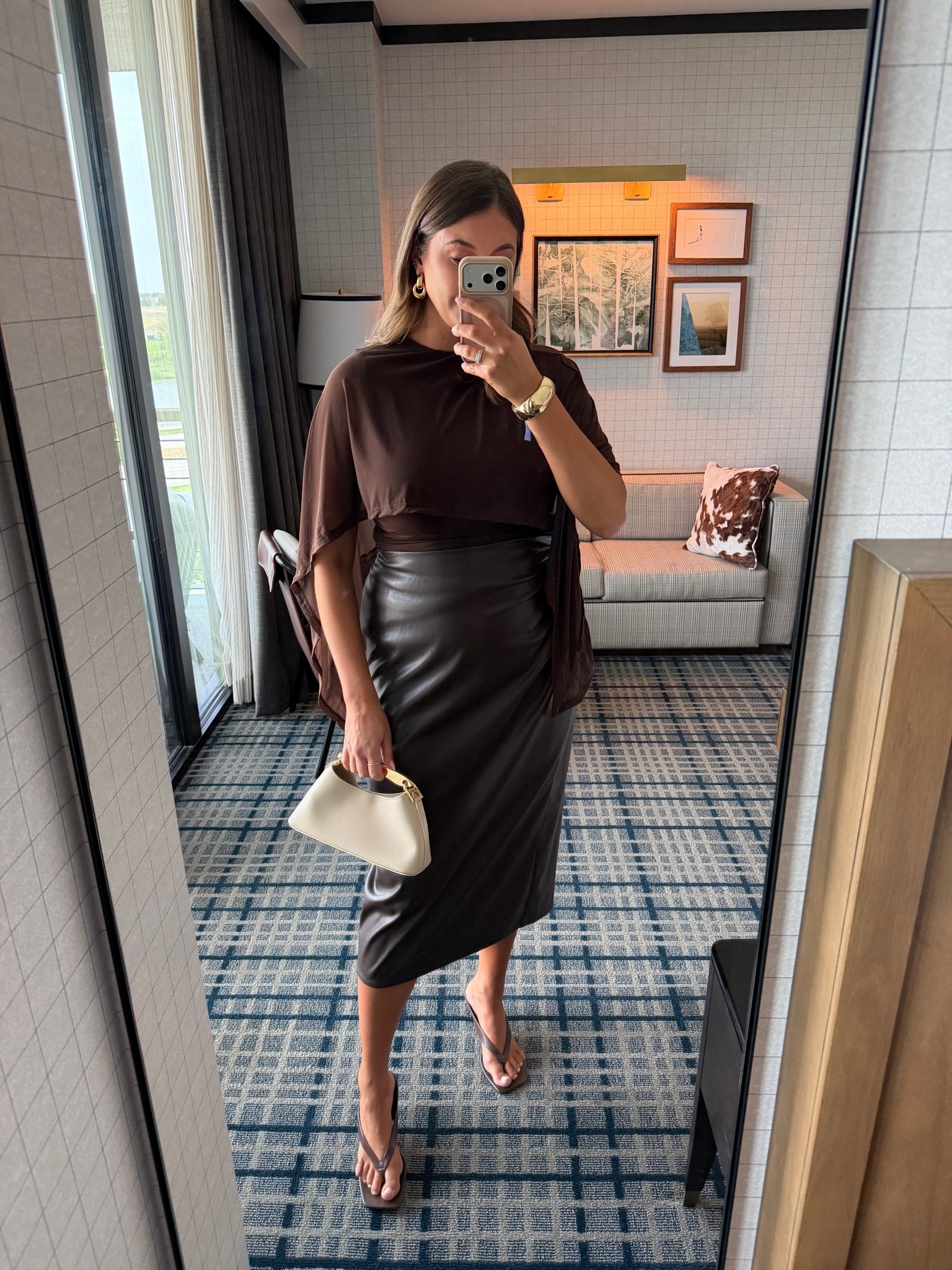 Chocolate brown everything 🤎 This monochromatic look feels so chic for fall—especially with the faux leather midi skirt and little cream bag.

chocolate brown outfit, faux leather midi skirt, fall outfit idea, size 14 outfit, size large top, elevated fall style, brown monochromatic outfit, fall date night outfit

#LTKCon #LTKWorkwear #LTKMidsize