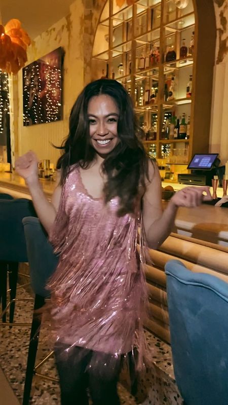 Everything about this pink cocktail mini fringe dress is dazzling! 💖 I love the way it sways when you dance and move, and it’s the perfect sparkly attire to wear when you’re having a fun girl’s night out or Valentines Day! This dress is currently under $100 and it such great quality - shop it now on my LTK post! 

#LTKfindsunder100 #LTKMostLoved #LTKparties