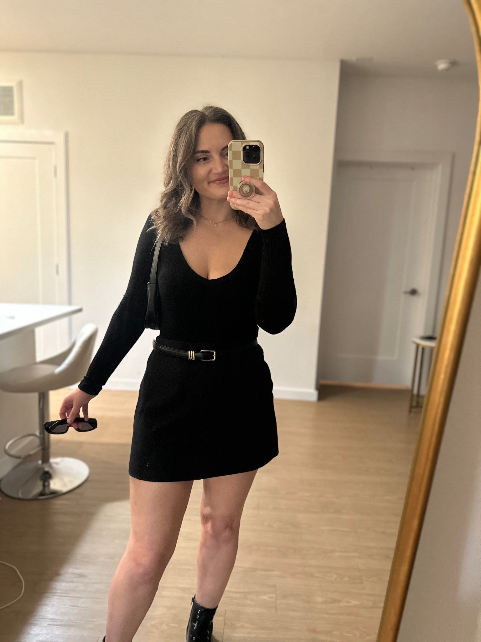 M in black long sleeve bodysuit (super old from F21)
M in skort