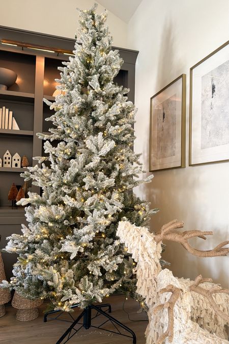 Our flocked tree! We have the King Flock - currently $300 off! We’ve had this one for a few years & love! Needs a little fluffing - cannot wait to decorate! 

#LTKhome #LTKHoliday #LTKSeasonal