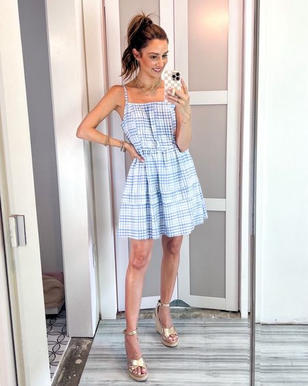 Sale alert!!! This blue gingham dress is a fave and top seller! Adjustable straps, working front buttons, side zip closure, and SHORTS underneath… comfort level 10 🙌. It also comes in a pink multi color as well! I’m wearing an XS and I’m 5’4 for reference! And the gold strap wedges are sold out so I’ll link similar!

#LTKParties #LTKFindsUnder100 #LTKSaleAlert