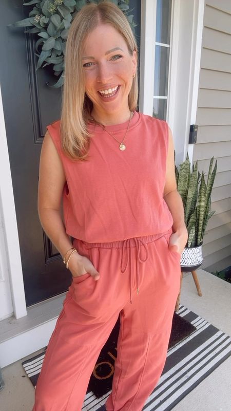 MOM FIT JUMPSUIT OOTD ✨ it’s the open back for me! 😍

This sleeveless jumpsuit is perfect for travel & lounging! Features an open back & pockets. Jogger pants tracksuit style, elastic tie waist, wearing my true size small & I’m 5’2” for ref 

Rayon & polyester, machine wash 

#momstyle #stylereels #outfitreel #outfitideas  #outfitinspo #petitefashion #styletrends #summerstyle #outfitoftheday #outfitinspiration #stylereel #tryonreel #casualstyle #everydaystyle #affordablefashion  #styleinfluencer #outfitidea #fashionmusthaves #comfyoutfits #casualoutfits #summerstyle #jumpsuit #onesie #momfit #momstyle #momstyleblogger 
#OOTD

Onesie
Jump suit
Spring outfit 
Athleisure 