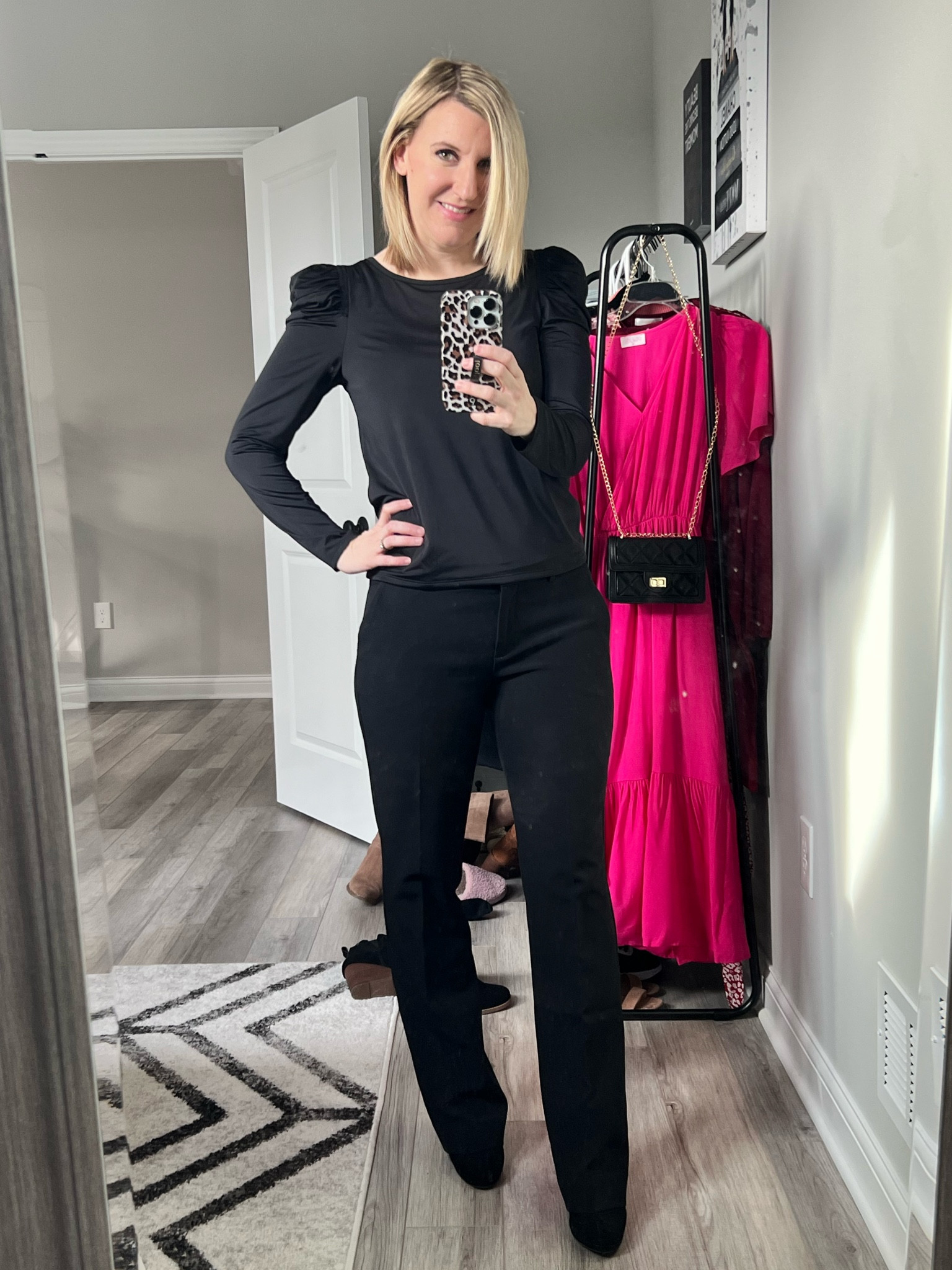 Cold temperatures have returned after our false spring so I broke out my Wednesday Addams gear again. I’m obsessed with this shirt from express! Super cute touching and shoulder detail. Wearing a small on top and size 4 boot cut pants. 

#LTKworkwear #LTKsalealert #LTKstyletip