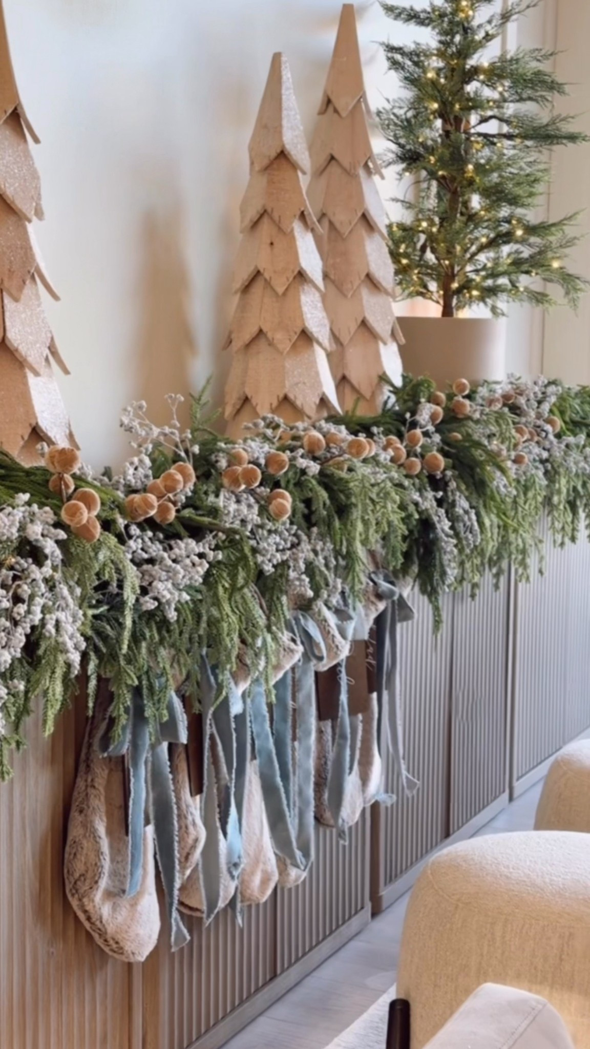Loving how the natural wood tones and snowy garland came together in this corner of the new house. It feels calm, cozy, and so perfectly wintery.😍

#holidayinspo #christmasdecor #neutralhome #homedesign #amazonhome

#LTKHome #LTKStyleTip #LTKHoliday