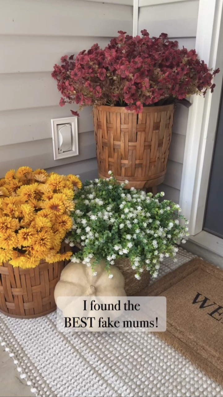The best artificial mums! 🌼😍
Comment STEMS for a DM with the links!

These are an Amazon find and I LOVE THEM:
🤎 sells by 16 stems a bunch, can deff pass with 16 and still look full!
🤎 this look is 24 stems! The smaller basket with white flowers is filled with 20 stems.
🤎 MULTIPLE color options! I bought “fall yellow” for this year 
🤎 any foam filler is great, add cardboard or plastic to fill the bottom so you can use less foam blocks!

For reference, those white flowers have been out SINCE LAST YEAR and are still in beautiful condition! We are here for longevity decor 🙌🏼

#frontporchdecor #fallporchdecor #fallporch #porchdecor #fauxflowers