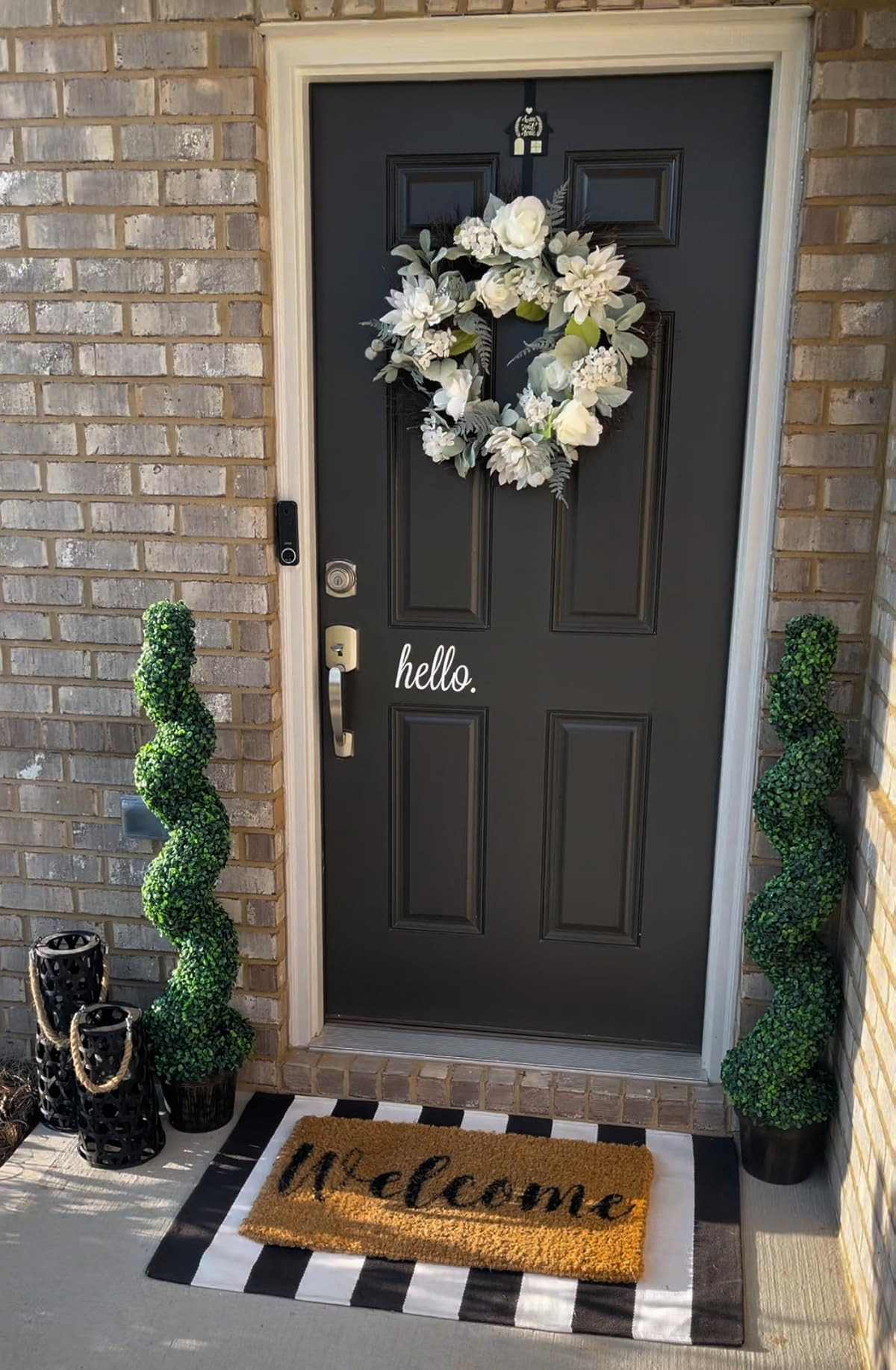 Front Porch Styling Idea | Amazon Outdoor Decor

A classic front porch look that works all year long. I styled this entry with spiral topiary trees, a layered doormat, and a neutral floral wreath to keep the space timeless and welcoming.

Topiary trees are one of my favorite outdoor decor pieces because they work for every season. Simply swap the wreath or mat and your porch instantly feels refreshed.

Shop all the pieces from this look below to recreate this welcoming entryway.

Let’s decorate. 🖤 

 #LTKSpringSale #LTKSeasonal #LTKHome