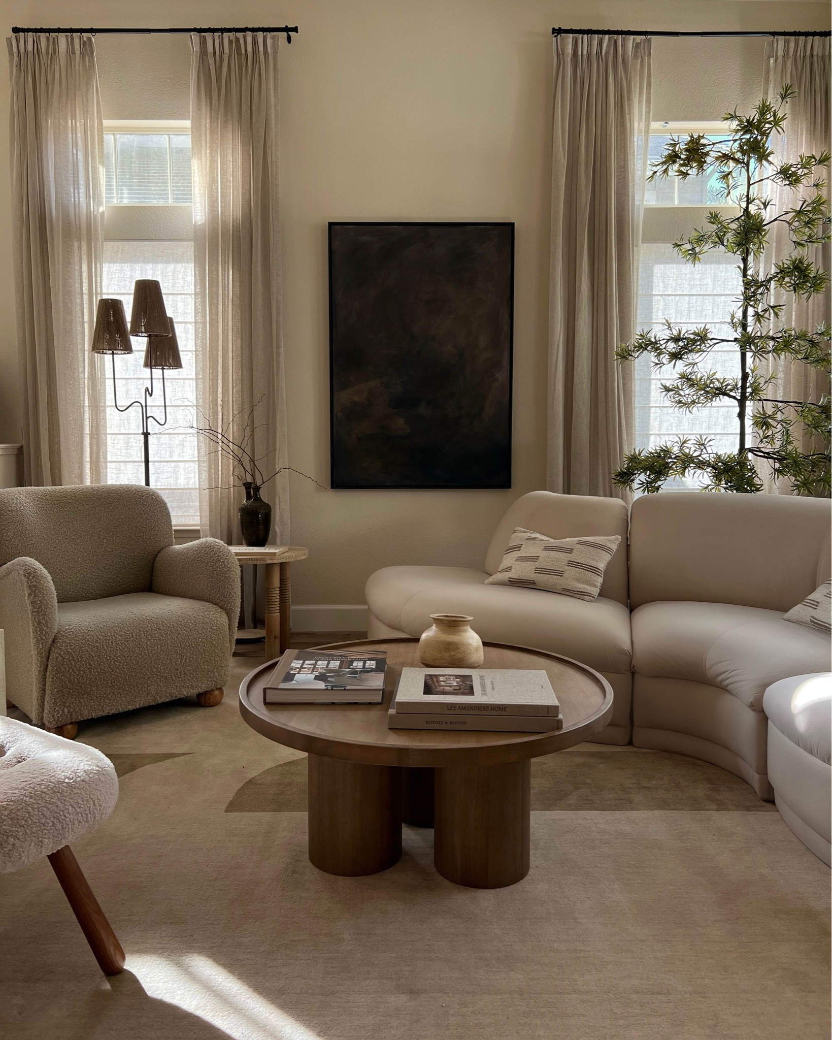 living room links 🤎 curved sectional is vintage and the art was made by me 

#LTKhome