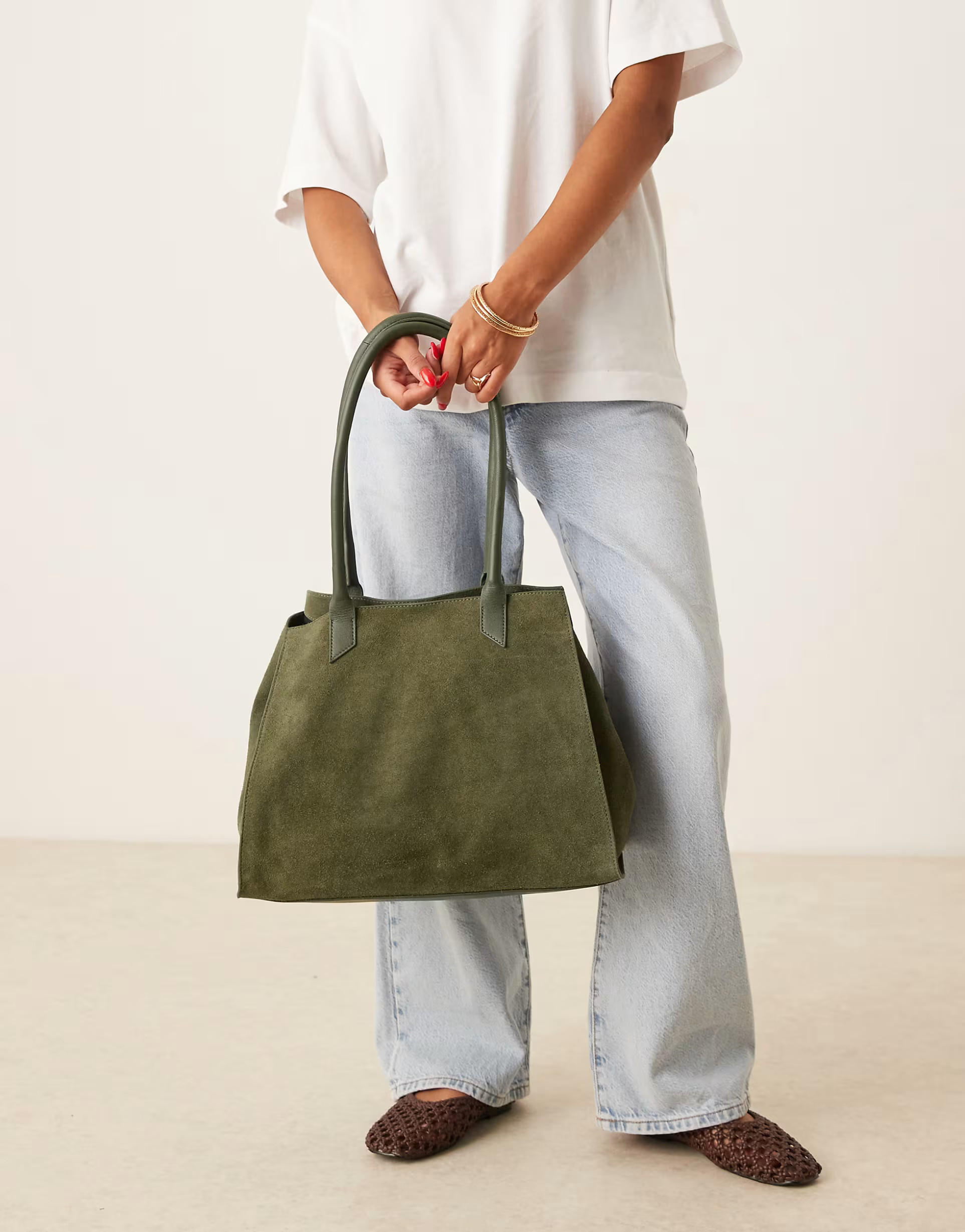 ASOS DESIGN suede tubular handle winged tote bag in forest green | ASOS (Global)