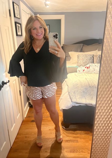 This top is so flattering! It’s easily dressed up or dressed down. 
I wore it to work today with these animal print shorts.

#LTKSeasonal #LTKunder50 #LTKstyletip