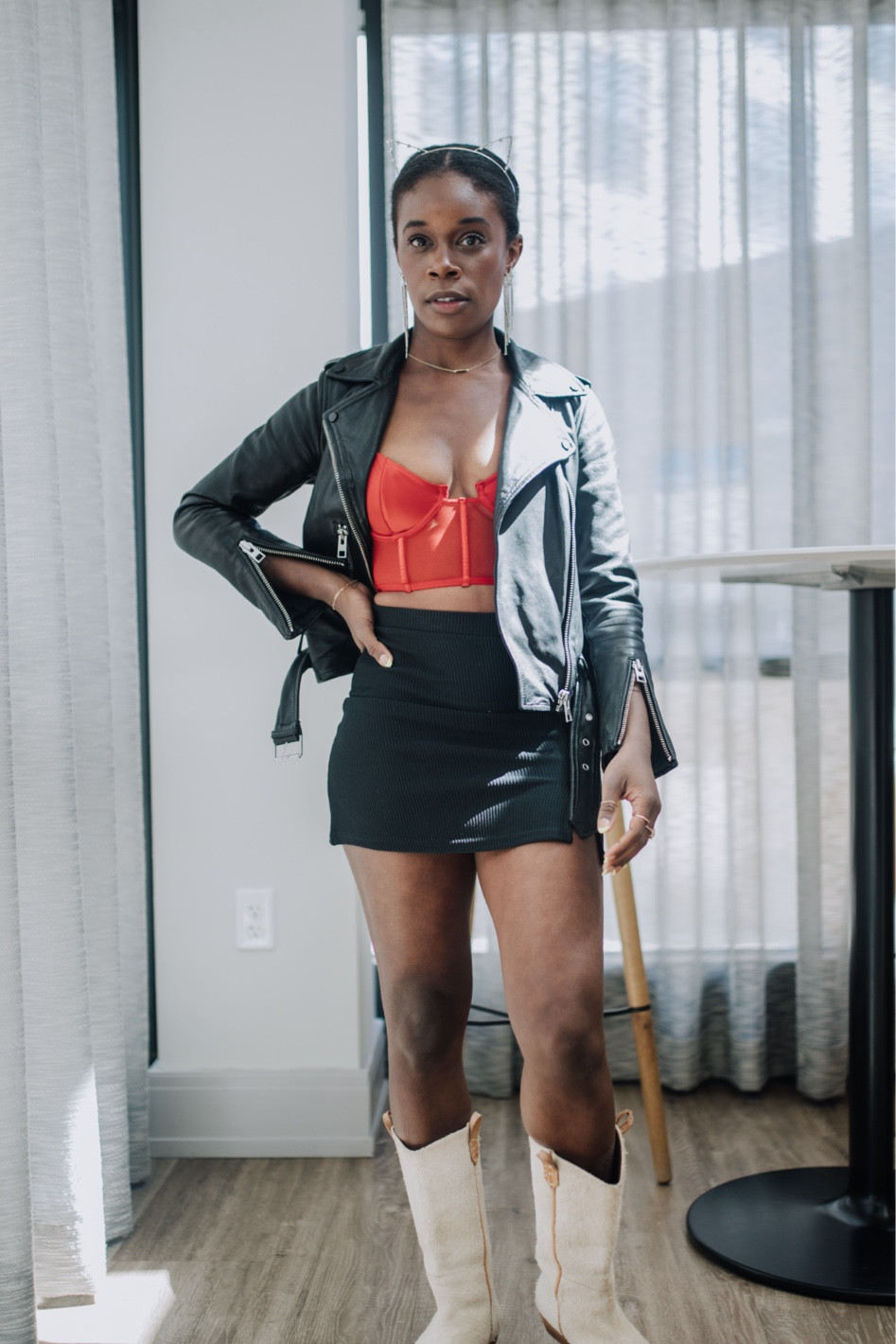 Taylor Swift concert outfit idea for her country concert at Gillette Stadium for the Eras Tour, but make it Red with a corset top, black mini skirt, white western cowboy boots and a leather jacket! 

#LTKFind #LTKstyletip #LTKSeasonal