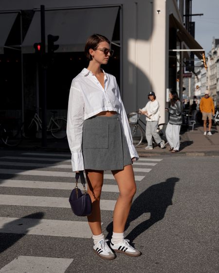 in the streets of CPH wearing a cropped shirt and layered skirt as well as Adidas Samba sneakers 🤍

#LTKitbag #LTKstyletip #LTKeurope