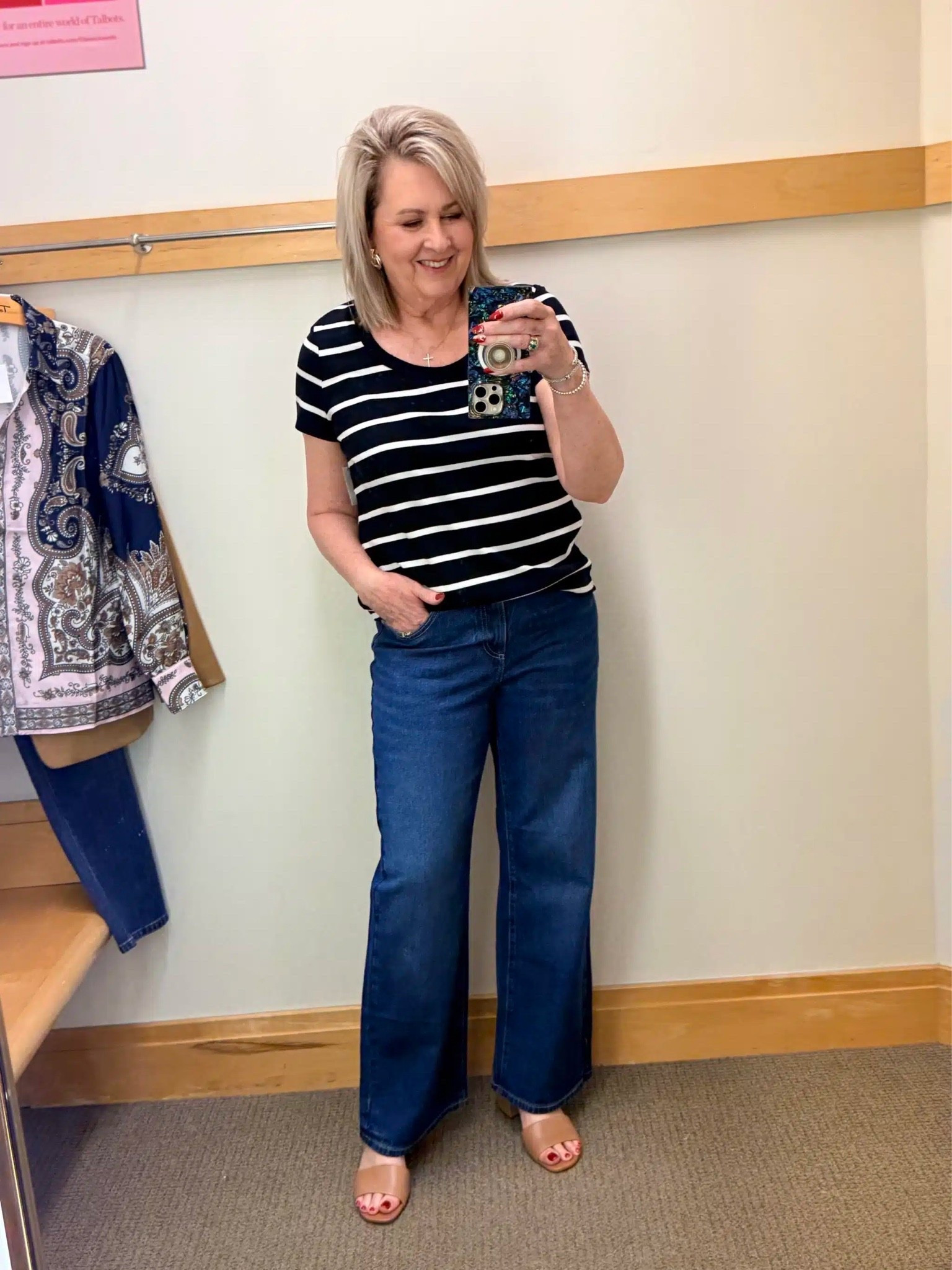 This striped tee is one that can go with just about anything. It’s navy and white, so the colors are classic too. I’m wearing a size large and have it paired with some dark wash trousers for a more classic look. My jeans are a size 8.

#LTKWorkwear #LTKOver40 #LTKootd